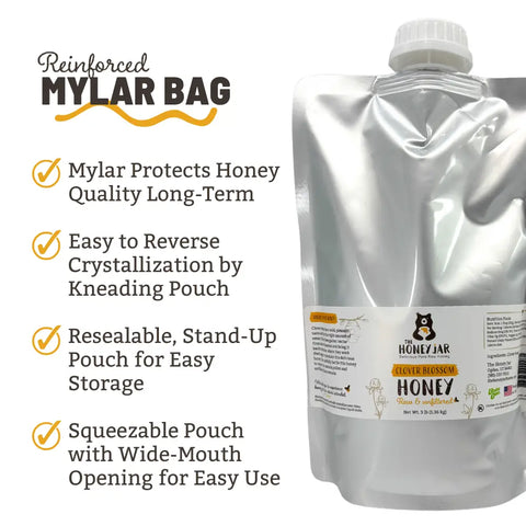 Mylar bag labelled as The Honey Jar Clover Blossom Honey next to info list. mylar protects honey quality long term easy to reverse crystallization by kneading pouch resealable stand-up pouch for easy storage squeezable pouch with wide-mouth opening for easy use